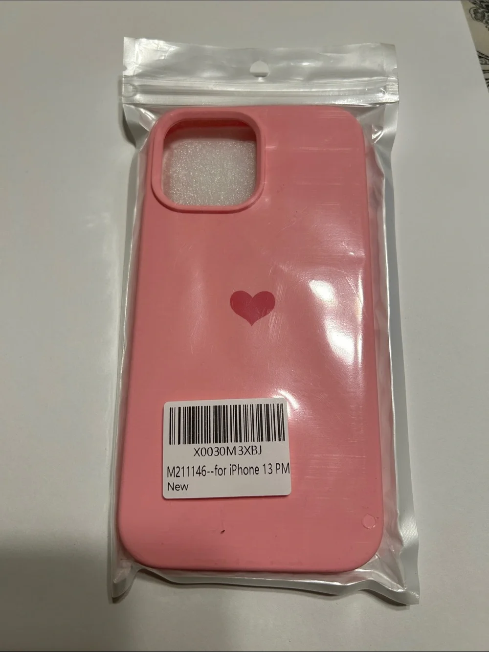 Pink Silicone iPhone 14 Pro Max Case with Heart Accent